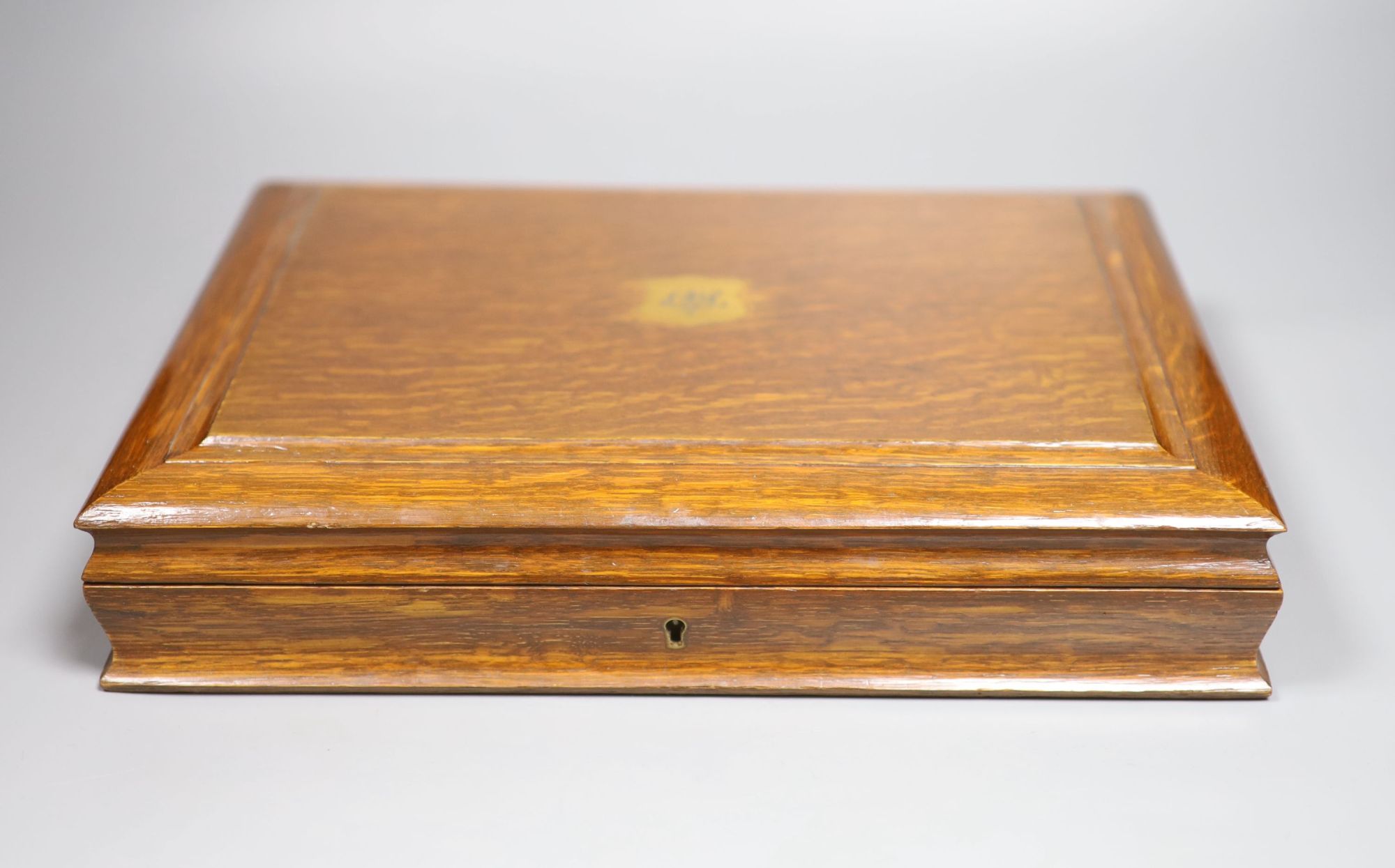 A Victorian oak cased set of twelve pairs of ivory handled silver dessert eaters, Frederick Elkington, Birmingham, 1890, box 34.8cm.